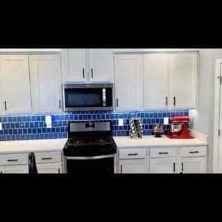 All-white kitchen cabinet repaint in Daphne, Alabama