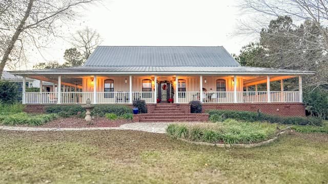Cedar board-and-batten exterior repaint in Stapleton, Alabama