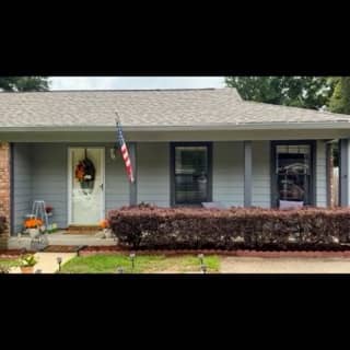 Gray wood siding exterior repaint in Daphne, Alabama