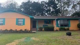 Statement orange exterior repaint in Spanish Fort, Alabama