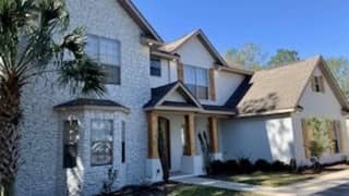 White-painted brick exterior repaint in Spanish Fort, Alabama