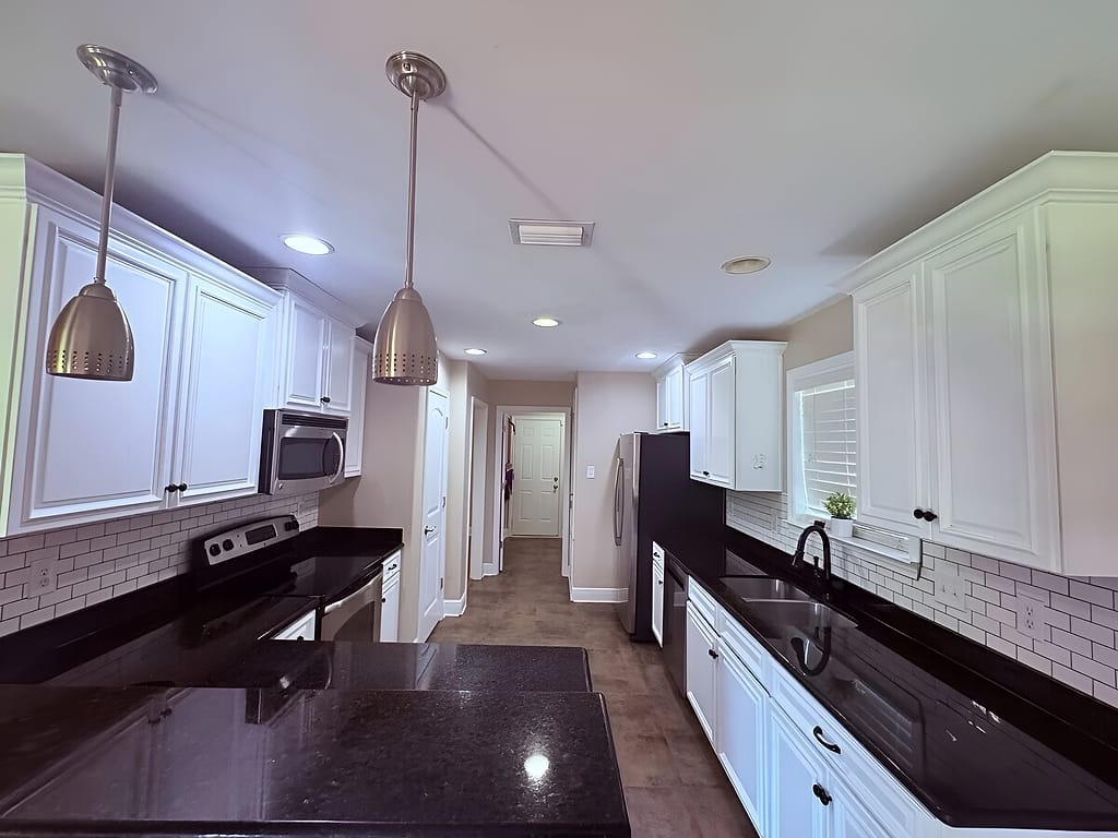 Kitchen Beige Walls White Trim: Cabinet Painting in Semmes, Mobile County, Alabama by Paint Doctors LLC.