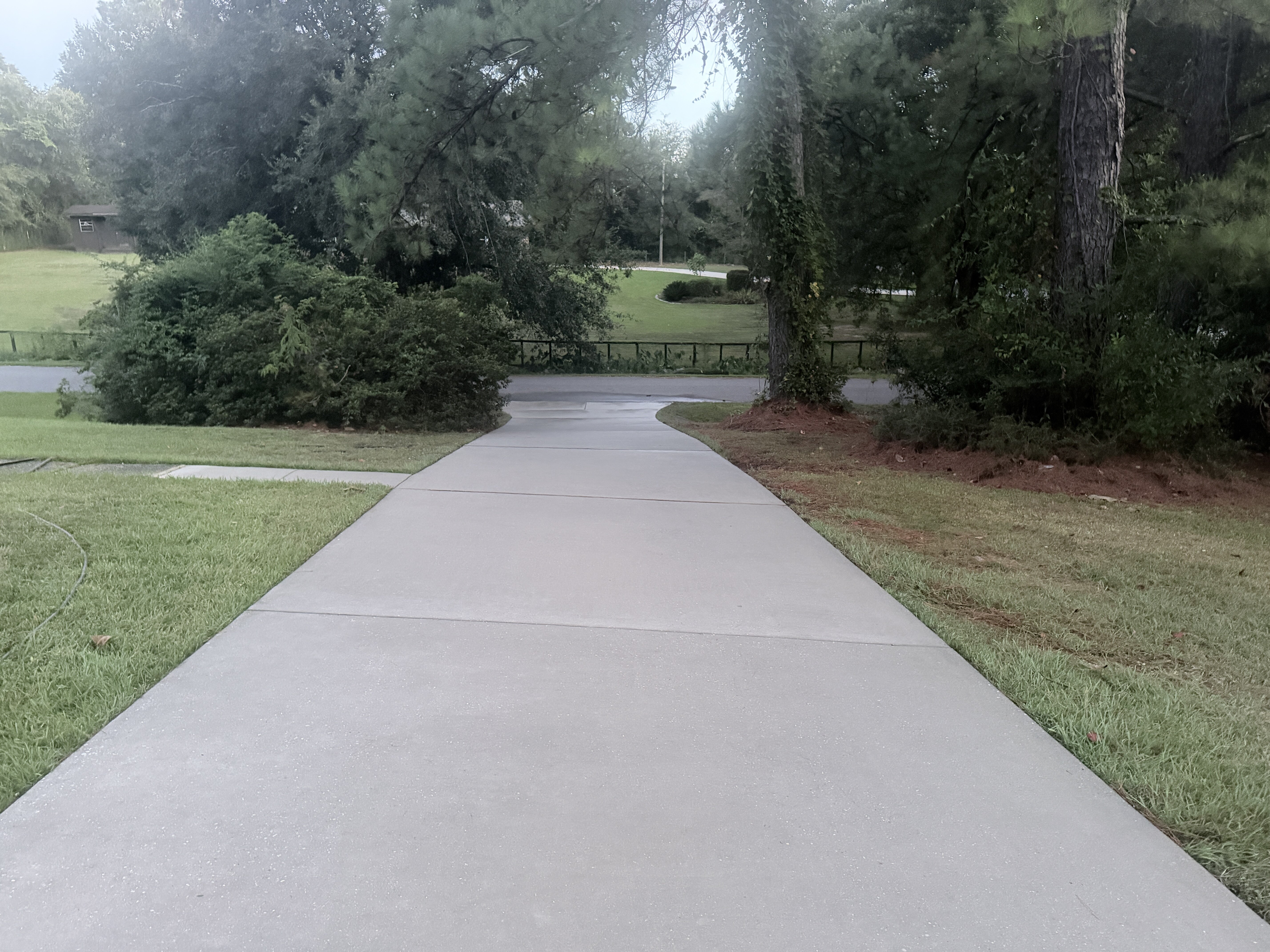 Clean Concrete Driveway Power Washed — Exterior Painting in Daphne, Baldwin County, Alabama by Paint Doctors LLC.
