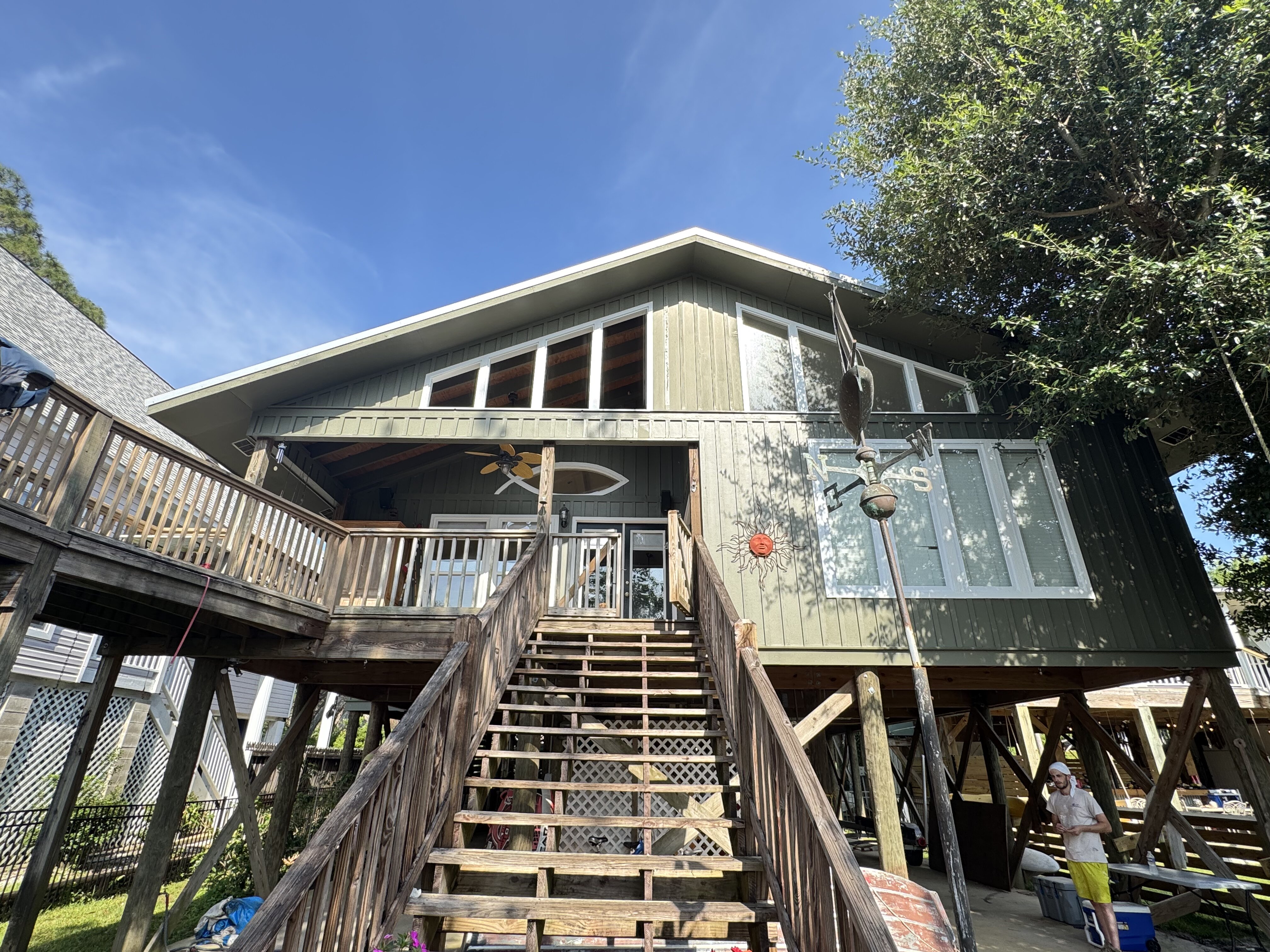 Two Tone Olive And Yellow Stilt House Repaint — Exterior Painting in Fairhope, Baldwin County, Alabama by Paint Doctors LLC.
