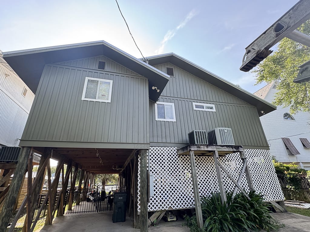 Olive Green Rear Gables Stilt House Repaint: Exterior Painting in Fairhope, Baldwin County, Alabama by Paint Doctors LLC.