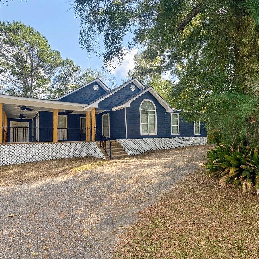 Wood Siding Dark Blue White Trim Cedar Wrap Columns — Exterior Painting in Loxley, Baldwin County, Alabama by Paint Doctors LLC.