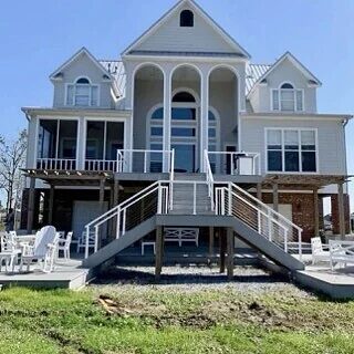 Wood Siding Full Repaint Gray Body White Trim — Exterior Painting in Theodore, Mobile County, Alabama by Paint Doctors LLC.