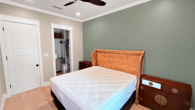 Paint Guru render — Evergreen Fog accent wall with Accessible Beige walls and Extra White trim