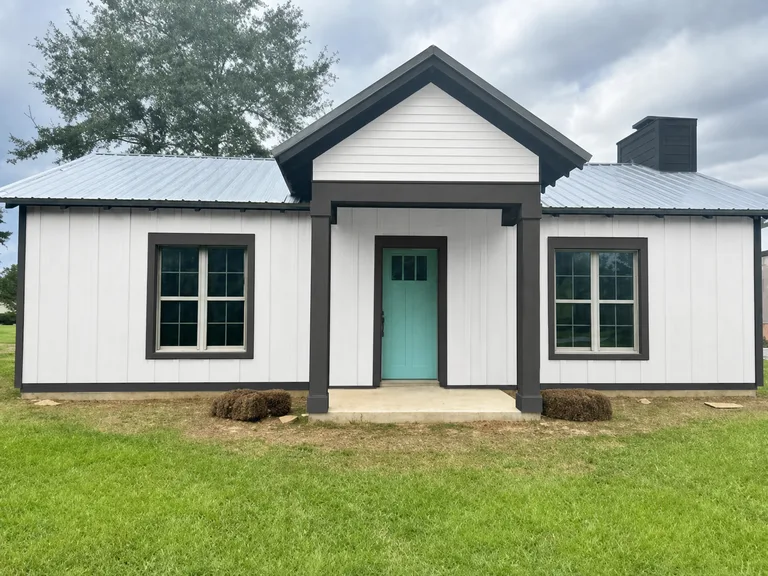 Paint Guru render — farmhouse exterior in Pure White with every trim element in Iron Ore