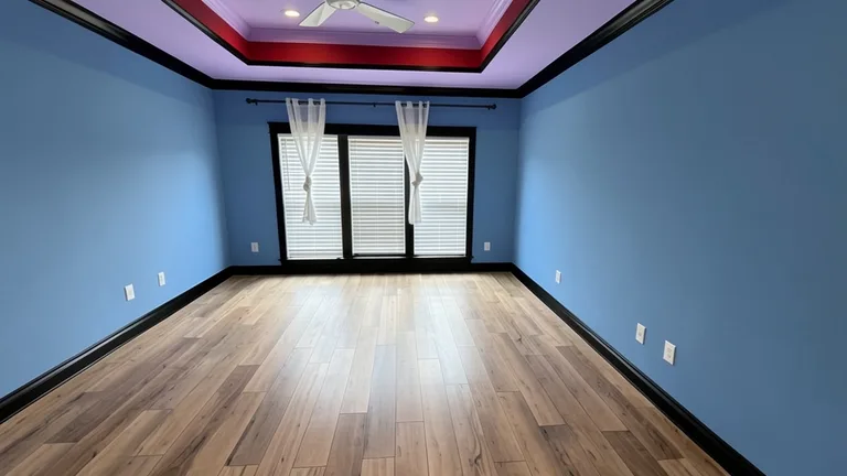 Paint Guru render — Smoky Blue walls with a Red Barn tray ceiling inset and Tricorn Black trim